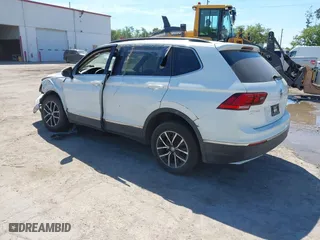 2021 Volkswagen Tiguan SE with VIN 3VV2B7AX4MM031490, listed as a IAAI auction lot 41829654 with 55,739 mi miles. Bid and sale history available at carsss.com. Image 3.