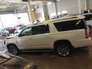 2015 GMC Yukon XL Denali with VIN 1GKS2JKJXFR528927, listed as a IAAI auction lot 41391259 with 159,467 mi miles. Bid and sale history available at carsss.com. Image 14.