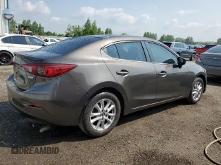 2014 Mazda 3 i Touring with VIN JM1BM1V79E1151770, listed as a Copart auction lot 60100155 with 274,752 mi miles and Salvage title. Bid and sale history available at DreamBid. Image 3.