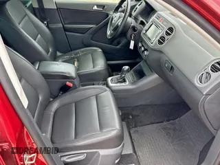 2011 Volkswagen Tiguan SEL with VIN WVGAV7AX1BW000384, listed as a Copart auction lot 59420805 with 166,245 mi miles and Clean title. Bid and sale history available at DreamBid. Image 5.