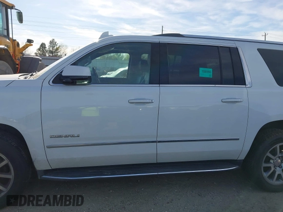 2019 GMC Yukon XL Denali with VIN 1GKS1HKJ8KR378385, listed as a IAAI auction lot 41824529 with 115,481 mi miles. Bid and sale history available at carsss.com. Image 14.