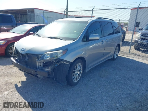 2011 Toyota Sienna SE with VIN 5TDXK3DC8BS131434, listed as a IAAI auction lot 42002675 with 209,396 mi miles. Bid and sale history available at carsss.com. Image 2.