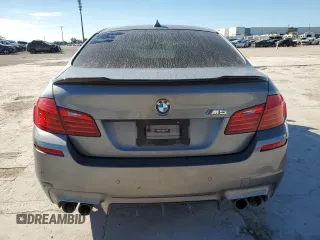 2014 BMW M5 with VIN WBSFV9C52ED097797, listed as a Copart auction lot 81085504 with 83,990 mi miles and Salvage Title. Bid and sale history available at carsss.com. Image 6.