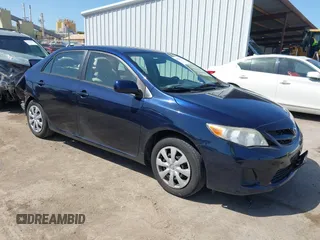 2011 Toyota Corolla L with VIN JTDBU4EE9B9167657, listed as a IAAI auction lot 41970387 with 89,300 mi miles. Bid and sale history available at carsss.com. Image 1.