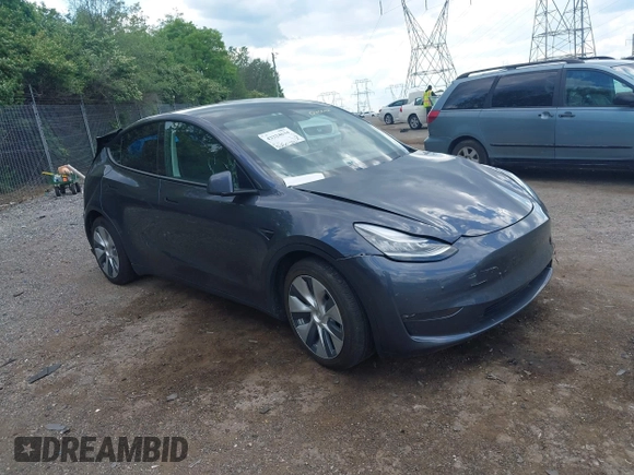 2021 Tesla Model Y Long Range z VIN 5YJYGDEE6MF070068, wystawiony jako IAAI lot #42224634 z przebiegiem 33 850 mil mil oraz . Historia ofert i sprzedaży dostępna na DreamBid. Obrazek 1.