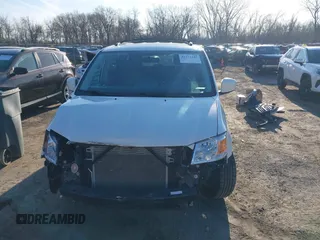 2010 Dodge Grand Caravan SXT with VIN 2D4RN5DX8AR239352, listed as a IAAI auction lot 41773487 with 86,084 mi miles and . Bid and sale history available at DreamBid. Image 12.