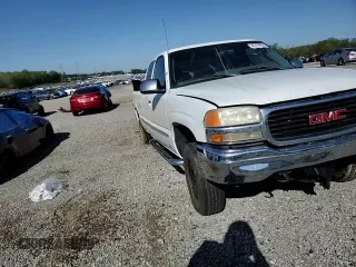 1999 GMC Sierra 1500 SLE z VIN 2GTEK19TXX1551778, wystawiony jako Copart lot #52279055 z przebiegiem 302 182 mil mil oraz Szkoda całkowita • Salvage title. Historia ofert i sprzedaży dostępna na DreamBid. Obrazek 11.