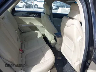 2014 Lincoln MKZ z VIN 3LN6L2GKXER809691, wystawiony jako IAAI lot #41588488 z przebiegiem 163 552 mil mil oraz . Historia ofert i sprzedaży dostępna na DreamBid. Obrazek 8.