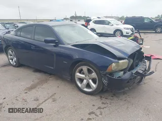 2014 Dodge Charger RT z VIN 2C3CDXCT9EH114702, wystawiony jako IAAI lot #41945611 z przebiegiem 196 875 mil mil oraz . Historia ofert i sprzedaży dostępna na DreamBid. Obrazek 1.