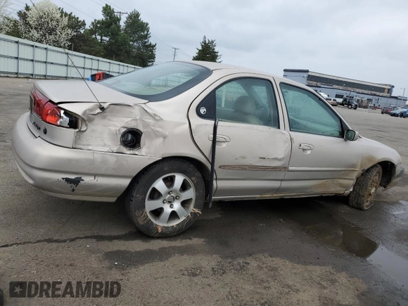 1998 Mercury Mystique z VIN 3MEFM66L4WM611303, wystawiony jako Copart lot #51298355 z przebiegiem 109 671 mil mil oraz Szkody całkowita. Historia ofert i sprzedaży dostępna na DreamBid. Obrazek 3.
