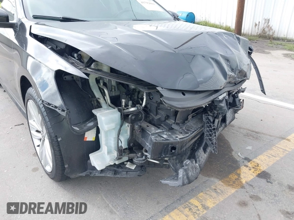 2019 Volkswagen Passat 2.0T Wolfsburg Edition with VIN 1VWLA7A34KC012887, listed as a IAAI auction lot 41792604 with 70,237 mi miles. Bid and sale history available at carsss.com. Image 6.
