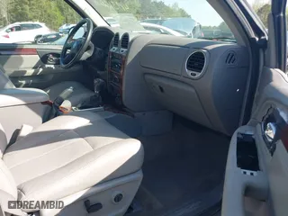2005 GMC Envoy SLE with VIN 1GKDS13S452306939, listed as a IAAI auction lot 41931667 with 236,955 mi miles. Bid and sale history available at carsss.com. Image 5.