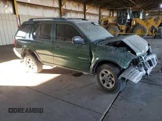 2002 Isuzu Rodeo z VIN 4S2CK58DX24320793, wystawiony jako Copart lot #46357065 z przebiegiem 180 306 mil mil oraz Szkody całkowita. Historia ofert i sprzedaży dostępna na DreamBid. Obrazek 4.