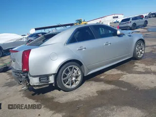 2009 Cadillac CTS-V z VIN 1G6DN57P090167350, wystawiony jako IAAI lot #41820827 z przebiegiem 210 266 mil mil oraz . Historia ofert i sprzedaży dostępna na DreamBid. Obrazek 4.