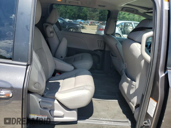 2015 Toyota Sienna XLE с VIN 5TDYK3DC7FS577620, выставлен на аукционе Copart как лот 65393635 с пробегом 179 998 миль миль и Чистый • Clean title. История ставок и продаж доступна на DreamBid. Изображение 11.