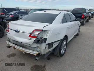 2013 Ford Taurus SEL with VIN 1FAHP2E87DG111530, listed as a IAAI auction lot 41322957 with 183,103 mi miles. Bid and sale history available at carsss.com. Image 4.