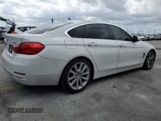 2016 BMW 4 Series 428i with VIN WBA4A9C5XGGL88217, listed as a Copart auction lot 56956985 with 156,209 mi miles and Salvage title. Bid and sale history available at DreamBid. Image 3.