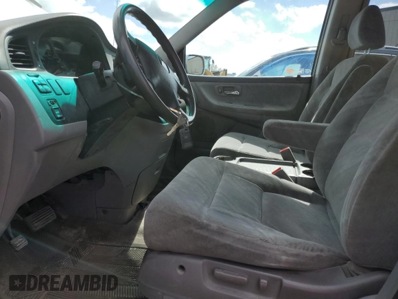 2002 Honda Odyssey EX with VIN 2HKRL186X2H006763, listed as a Copart auction lot 57317075 with 282,090 mi miles and Salvage title. Bid and sale history available at DreamBid. Image 7.