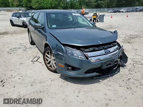 2012 Ford Fusion SEL z VIN 3FAHP0JA2CR404062, wystawiony jako Copart lot #58094315 z przebiegiem 94 635 mil mil oraz Czysty tytuł • Clean title. Historia ofert i sprzedaży dostępna na DreamBid. Obrazek 13.