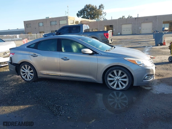 2013 Hyundai Azera with VIN KMHFH4JG3DA230844, listed as a IAAI auction lot 41817997 with 129,163 mi miles. Bid and sale history available at carsss.com. Image 14.