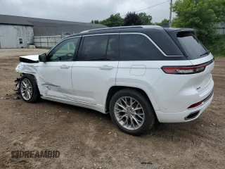 2022 Jeep Grand Cherokee Summit Reserve with VIN 1C4RJHEG6N8610843, listed as a Copart auction lot 63500415 with 77,436 mi miles and Clean title. Bid and sale history available at DreamBid. Image 2.
