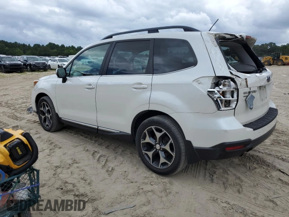 2015 Subaru Forester XT Touring with VIN JF2SJGUCXFH820469, listed as a Copart auction lot 62777665 with 90,389 mi miles and Salvage title. Bid and sale history available at DreamBid. Image 2.