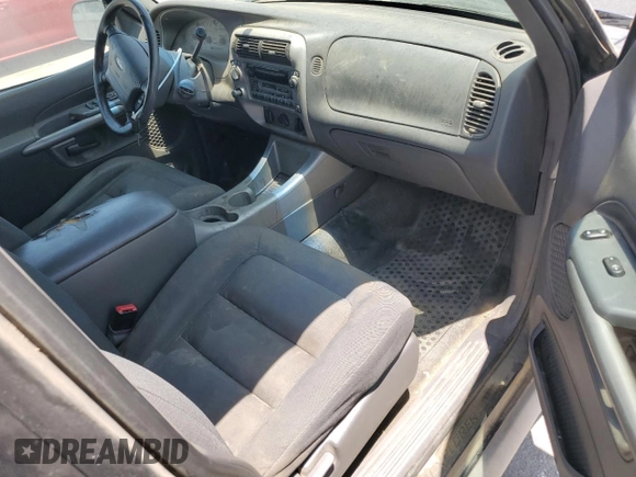 2001 Ford Explorer Sport Trac z VIN 1FMZU77E61UB26259, wystawiony jako Copart lot #62541145 z przebiegiem 258 417 mil mil oraz Czysty tytuł • Clean title. Historia ofert i sprzedaży dostępna na DreamBid. Obrazek 8.