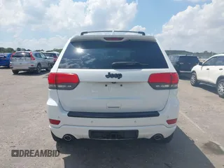 2015 Jeep Grand Cherokee Altitude with VIN 1C4RJEAG3FC722499, listed as a IAAI auction lot 41894727 with 105,616 mi miles. Bid and sale history available at carsss.com. Image 17.