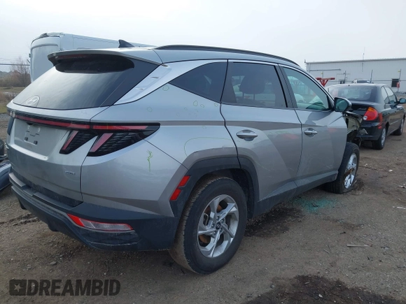 2022 Hyundai Tucson SEL z VIN 5NMJBCAE3NH070531, wystawiony jako IAAI lot #41222494 z przebiegiem 91 358 mil mil oraz . Historia ofert i sprzedaży dostępna na DreamBid. Obrazek 4.