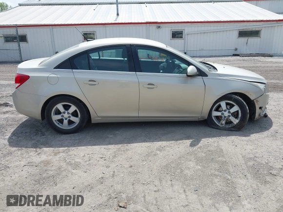 2014 Chevrolet Cruze 1LT z VIN 1G1PC5SB7E7419746, wystawiony jako IAAI lot #42135102 z przebiegiem 134 816 mil mil oraz . Historia ofert i sprzedaży dostępna na DreamBid. Obrazek 13.