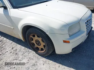 2005 Chrysler 300 Touring with VIN 2C3AA53G45H552972, listed as a IAAI auction lot 41996998 with 297,276 mi miles and . Bid and sale history available at DreamBid. Image 6.