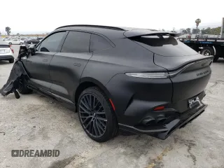 2023 Aston Martin DBX 707 z VIN SD7VUJBW2PTV06486, wystawiony jako Copart lot #55818283 z przebiegiem Nie podano mil oraz . Historia ofert i sprzedaży dostępna na DreamBid. Obrazek 2.