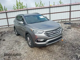 2018 Hyundai Santa Fe 2.4L with VIN 5NMZU3LB1JH100507, listed as a IAAI auction lot 42182116 with 103,826 mi miles and . Bid and sale history available at DreamBid. Image 1.
