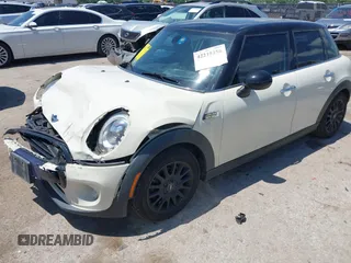 2016 MINI Hardtop 4 Door z VIN WMWXU1C50G2D08848, wystawiony jako IAAI lot #42215256 z przebiegiem 102 643 mil mil oraz . Historia ofert i sprzedaży dostępna na DreamBid. Obrazek 18.