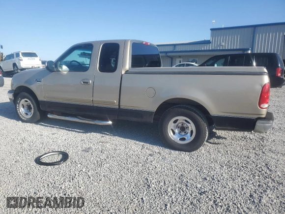 1999 Ford F-150 with VIN 1FTRX17W9XNB77873, listed as a Copart auction lot 52851065 with Not provided miles and Salvage title. Bid and sale history available at DreamBid. Image 2.