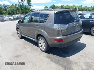 2012 Mitsubishi Outlander SE z VIN JA4AS3AW7CU014570, wystawiony jako IAAI lot #42340449 z przebiegiem 116 127 mil mil oraz . Historia ofert i sprzedaży dostępna na DreamBid. Obrazek 3.