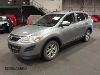 2012 Mazda CX-9 Touring with VIN JM3TB3CVXC0344611, listed as a IAAI auction lot 42473967 with 242,015 mi miles and . Bid and sale history available at DreamBid. Image 2.