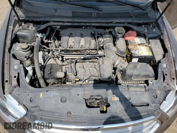 2015 Ford Taurus SEL with VIN 1FAHP2E82FG158662, listed as a Copart auction lot 58233875 with 159,174 mi miles and Salvage title. Bid and sale history available at DreamBid. Image 11.