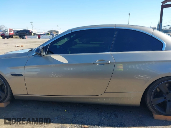 2007 BMW 3 Series 335i with VIN WBAWL73587PX49841, listed as a IAAI auction lot 41321892 with 173,556 mi miles. Bid and sale history available at carsss.com. Image 14.