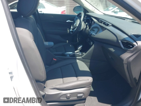 2023 Buick Encore GX Essence with VIN KL4MMFSL8PB028234, listed as a IAAI auction lot 42304513 with 14,538 mi miles and . Bid and sale history available at DreamBid. Image 5.