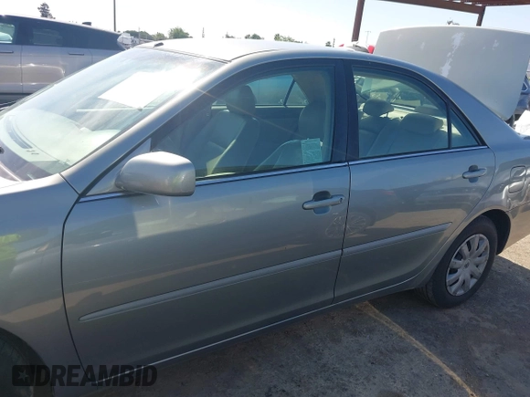 2005 Toyota Camry LE z VIN 4T1BE30K65U592500, wystawiony jako IAAI lot #42373718 z przebiegiem 189 054 mil mil oraz . Historia ofert i sprzedaży dostępna na DreamBid. Obrazek 14.