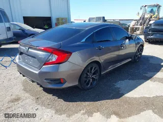 2021 Honda Civic Sedan Sport with VIN 19XFC2F81ME000807, listed as a IAAI auction lot 41742824 with 139,752 mi miles. Bid and sale history available at carsss.com. Image 4.