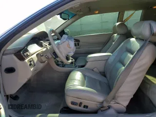 2000 Cadillac Eldorado z VIN 1G6EL12Y5YU176121, wystawiony jako Copart lot #77123914 z przebiegiem 91 663 mil mil oraz Szkoda całkowita • Salvage title. Historia ofert i sprzedaży dostępna na DreamBid. Obrazek 7.