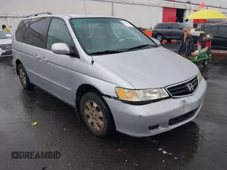 2004 Honda Odyssey EX-L with VIN 5FNRL18934B016420, listed as a IAAI auction lot 41473237 with 188,659 mi miles and . Bid and sale history available at DreamBid. Image 6.