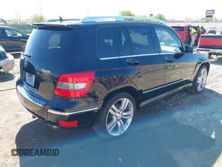 2012 Mercedes-Benz GLK with VIN WDCGG8HB6CF841198, listed as a IAAI auction lot 42021083 with 162,930 mi miles. Bid and sale history available at carsss.com. Image 4.