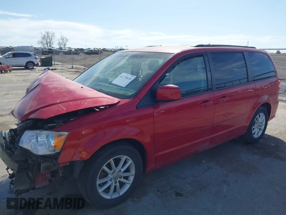 2014 Dodge Grand Caravan SXT with VIN 2C4RDGCG6ER477008, listed as a IAAI auction lot 41770610 with 89,843 mi miles and . Bid and sale history available at DreamBid. Image 2.