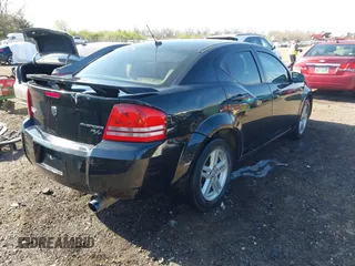 2010 Dodge Avenger R/T with VIN 1B3CC5FB9AN235125, listed as a IAAI auction lot 42056076 with 211,273 mi miles. Bid and sale history available at carsss.com. Image 4.