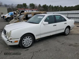 1996 Mercedes-Benz E-Class with VIN WDBJF55F5TJ022277, listed as a Copart auction lot 52597985 with 213,848 mi miles and Clean Title. Bid and sale history available at carsss.com. Image 1.