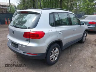 2016 Volkswagen Tiguan S with VIN WVGBV7AX1GW523335, listed as a IAAI auction lot 42091690 with 165,495 mi miles and . Bid and sale history available at DreamBid. Image 4.