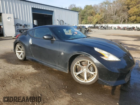2010 Nissan 370Z Touring with VIN JN1AZ4EH5AM501219, listed as a Copart auction lot 82434934 with 158,411 mi miles and Salvage Title. Bid and sale history available at carsss.com. Image 4.